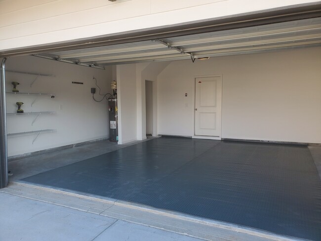 2 car garage with floor mat for easy maintenance - 95 Constitution Ave