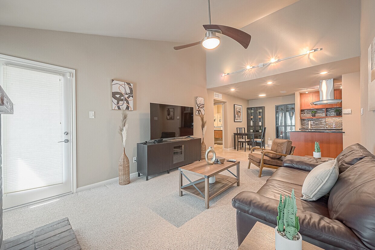 Living room, dining area and kitchen - 7950 N Stadium Dr