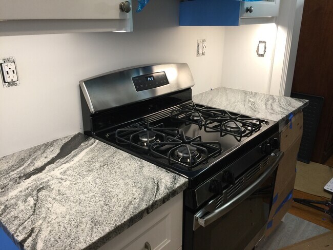 new gas stove - 541 Lamar Ave Apartment