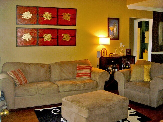 Living room and dining room areas in an open plan - 6305 Walden Park Dr