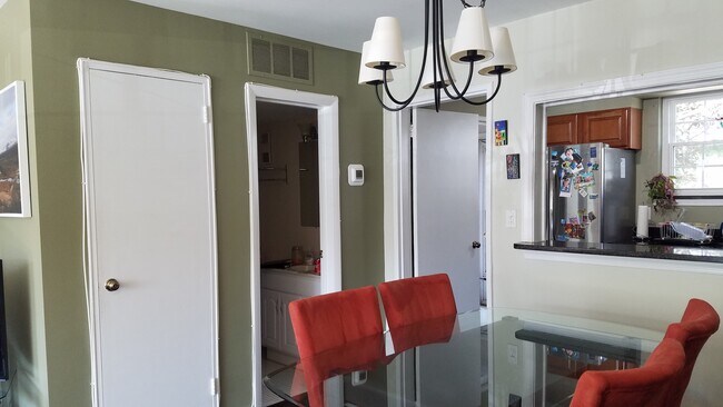 dining room / kitchen/half bath - 3817 Keller Ave