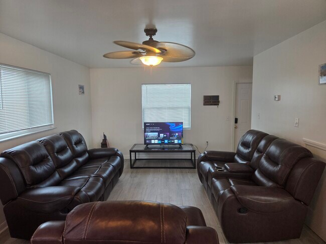 Leather reclining couch and sofa, Smart tv - 17317 Whitewater Ct