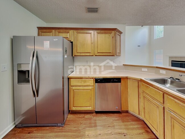 Foto del edificio - 3127 Majestic Oaks Ln