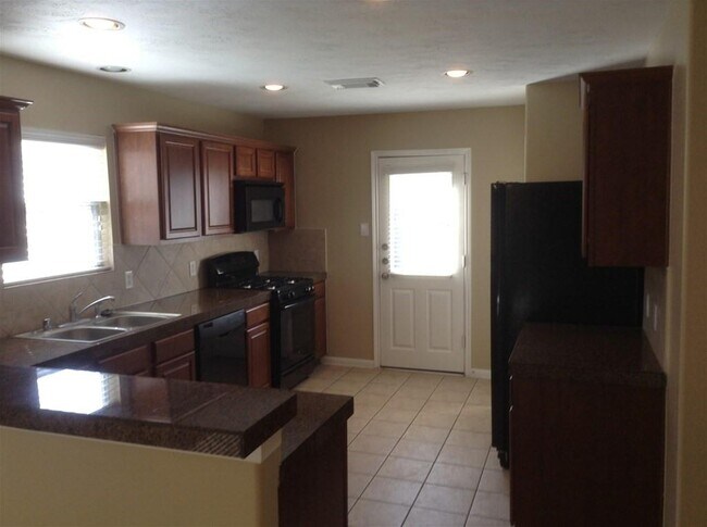 Foto del edificio - 8835 Windfern Trace Dr