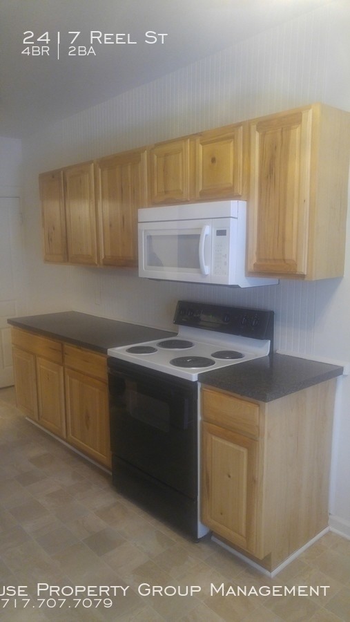 Building Photo - Spacious 4 bedroom Uptown