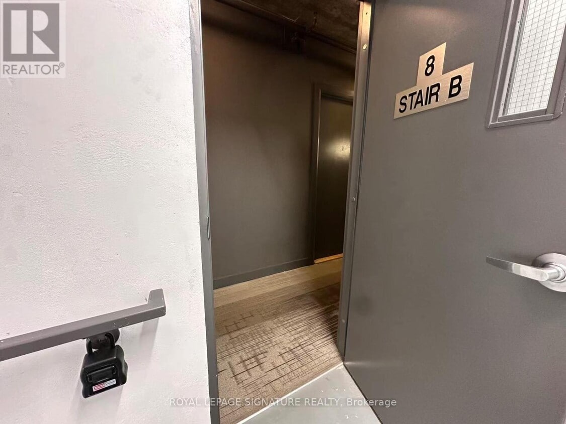 Photo du bâtiment - 210 Simcoe St