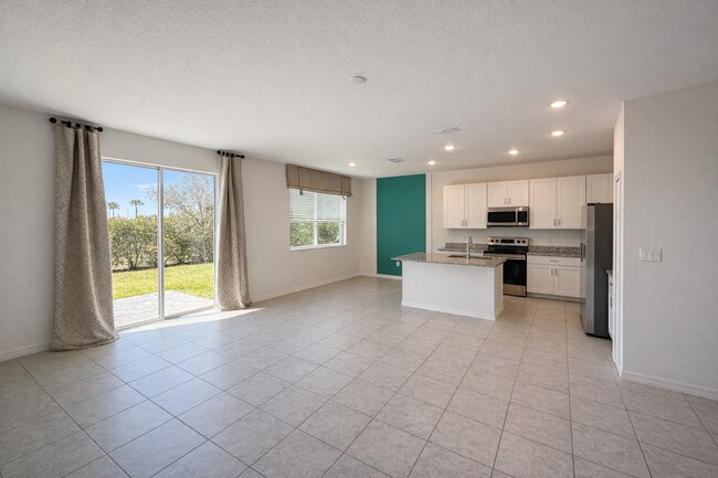 Foto del edificio - Charming 3-Bed Oasis with Elegance in Haines City!