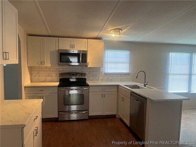 Foto del edificio - 6124 Heath Hawkins Ct