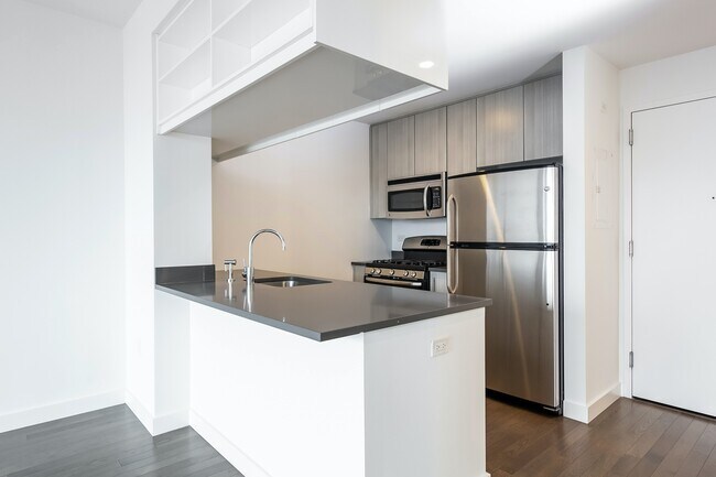 Building Photo - Bright corner one bed with W/D in unit