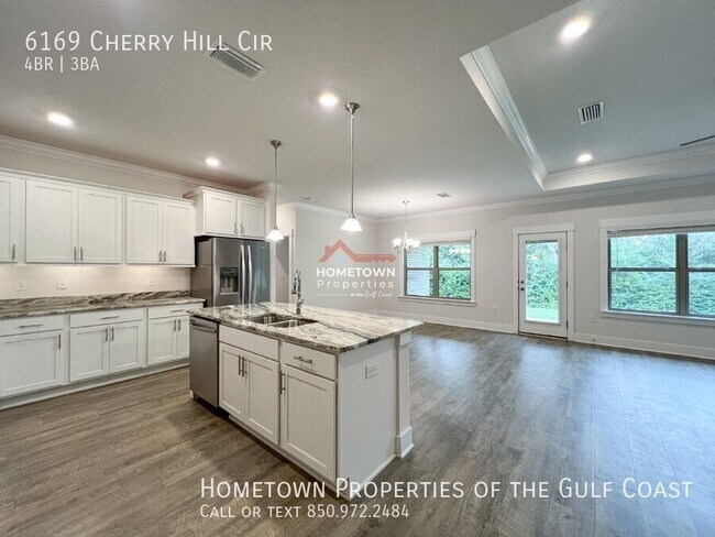 Building Photo - Spacious 4-Bedroom Sanctuary with Luxuriou...