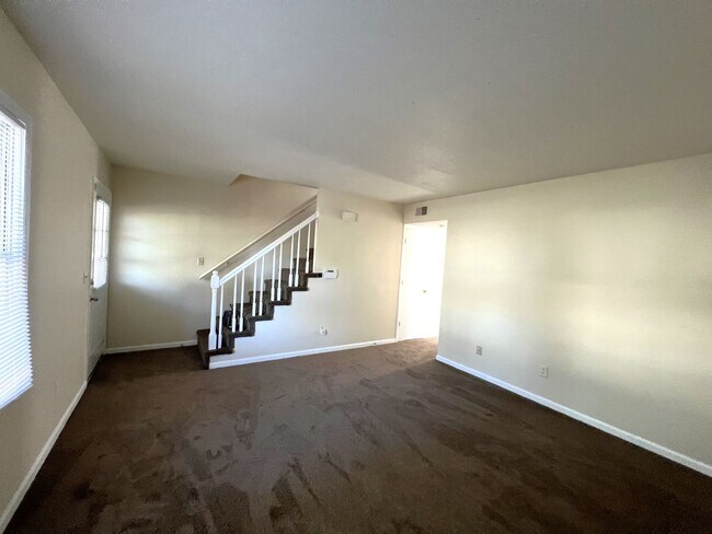 Building Photo - Two story duplex home! feels private like ...