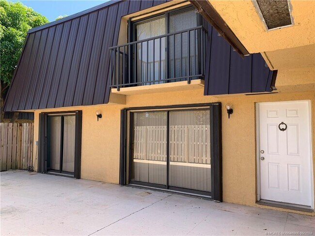 Building Photo - 6490 SE Windsong Ln