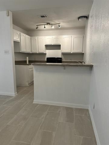 Foto del edificio - 7501 Windhaven Rd