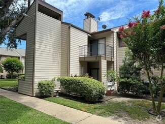 Building Photo - 7128 N Holiday Dr