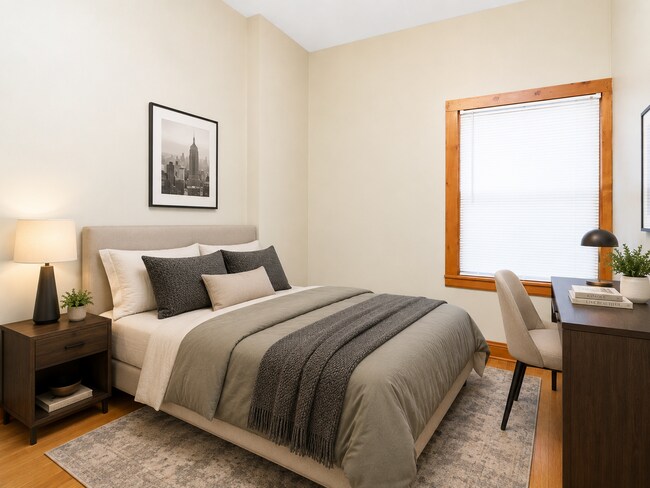 Foto del edificio - Spacious 2BR + Sunroom Main Floor in NE Arts District – Steps to Logan Park & Breweries