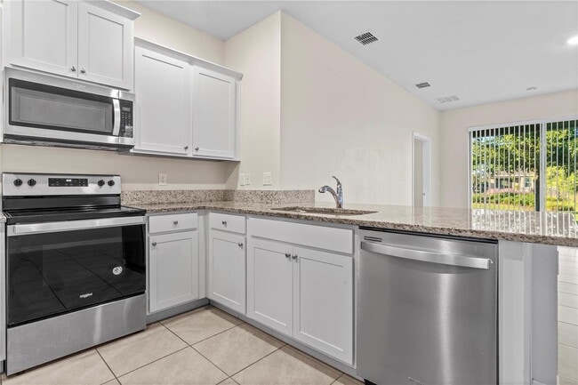 Building Photo - Enjoy all Wildwood has to offer, plus community amenities!