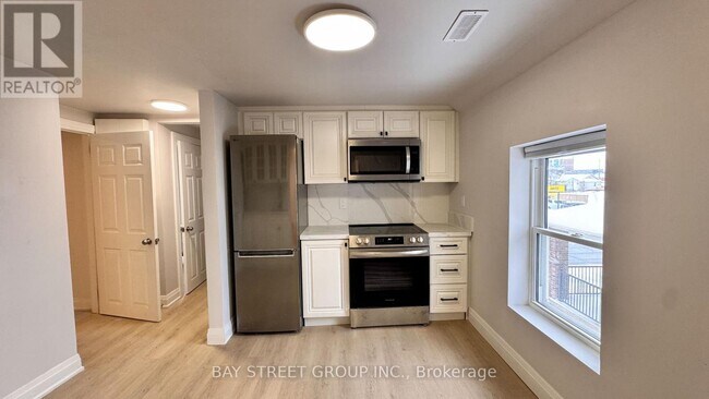 Building Photo - 5731 Stanley Ave