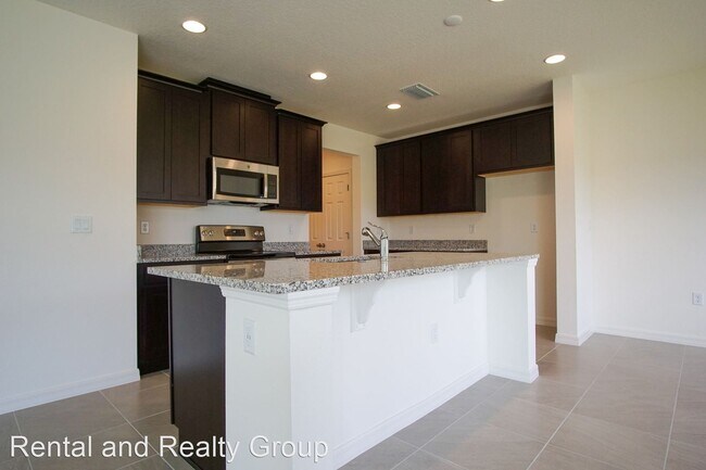 Foto del edificio - 5 br, 2.5 bath House - 1677 Swan Swim Dr