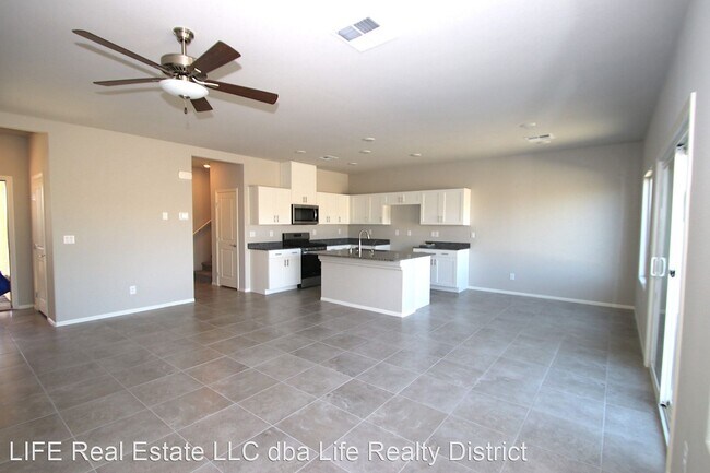 Building Photo - 4 br, 3 bath House - 8255 Selenite St.