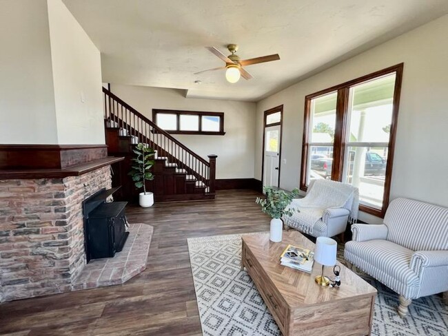 Living room with original bannister and trim - 771 Vance Ave