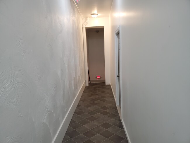 Back Stairs - 109 N Main St