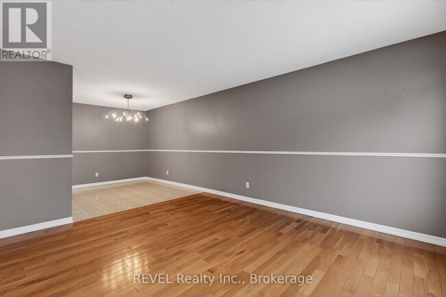 Building Photo - 6166 Wildrose Crescent