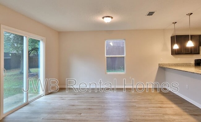 Building Photo - 5569 Cabot Dr N