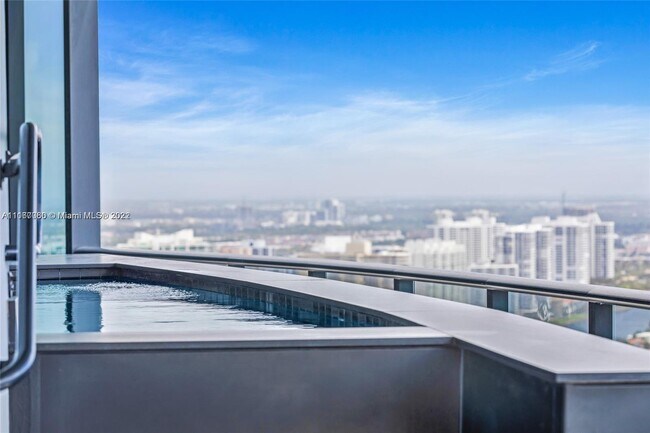 Building Photo - 18555 Collins Ave