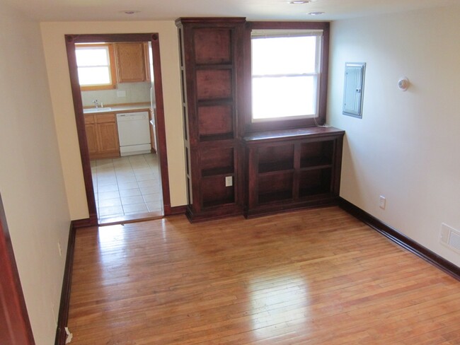 dining room with built in, main floor bedroom to left - 575 Jefferson Ave