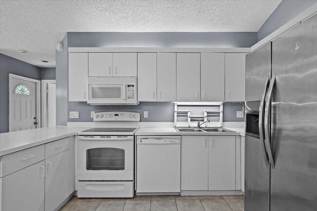 Photo - 12556 Woodmill Dr Townhome