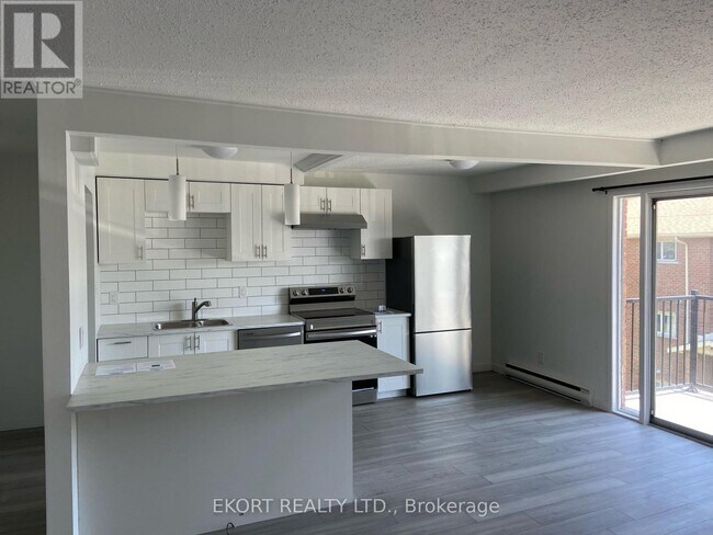 Photo du bâtiment - 153-153 N Park St