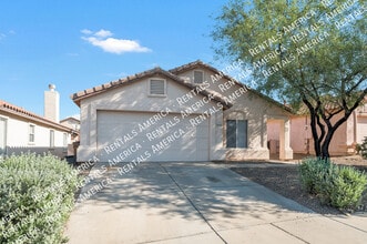 Building Photo - 5568 W Peaceful Dove Pl