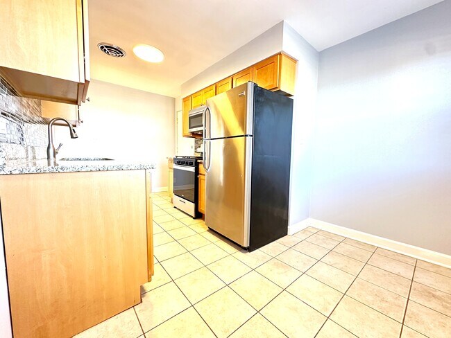 Photo - 6945 W Belmont Ave Apartments