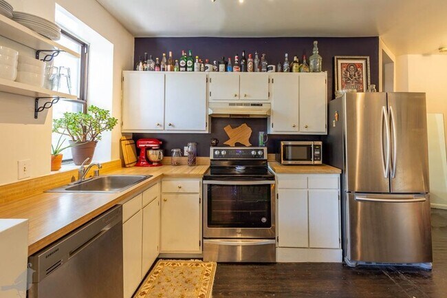 Building Photo - PRICE DROP!! Stunning Two Bedroom Condo in...