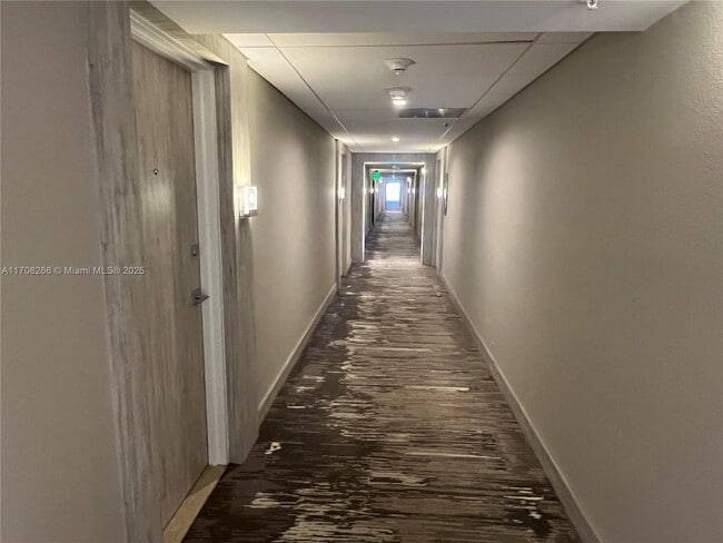 Building Photo - 10275 Collins Ave