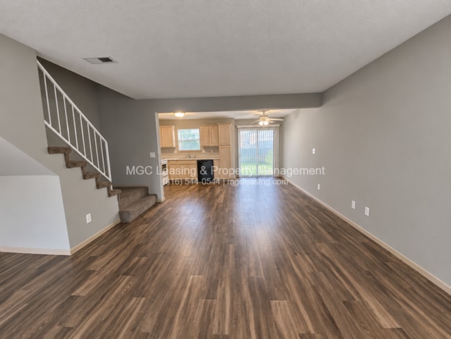 Building Photo - Inviting Harrisonville Townhome with Attached Garage & Cozy Fireplace