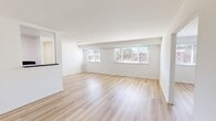 This 1030 square foot single-story home in Springfield, VA offers a blend of comfort and functionality. The property features three bedrooms, including a spacious primary bedroom of 190 square feet, and one bathroom. The open-concept living area showcases light wood-tone flooring, creating a bright and airy atmosphere enhanced by multiple windows that flood the space with natural light.

The kitchen is a highlight, featuring crisp white cabinetry, dark countertops, and stainless steel appliances, including a gas range for cooking enthusiasts. The bathroom combines functionality with style, boasting blue tiled walls and modern fixtures.

Each bedroom is generously sized, with plush carpeting for comfort underfoot. Built-in closets in each room provide ample storage space. The primary bedroom stands out with its ceiling fan and additional square footage.

Throughout the home, clean white walls and recessed lighting contribute to the overall modern aesthetic. The property's layout, as seen in the 3D floor plan, shows a thoughtful design that maximizes space efficiency. Large windows in the living areas not only bring in natural light but also offer views of the surrounding neighborhood, creating a connection with the outdoors while maintaining privacy.

Located at 5734 Backlick Rd, this home offers a perfect balance of indoor comfort and outdoor accessibility, making it an ideal residence in the heart of Springfield.