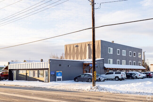 Highly Visible Three-Story Structure - Milepost O Apartments