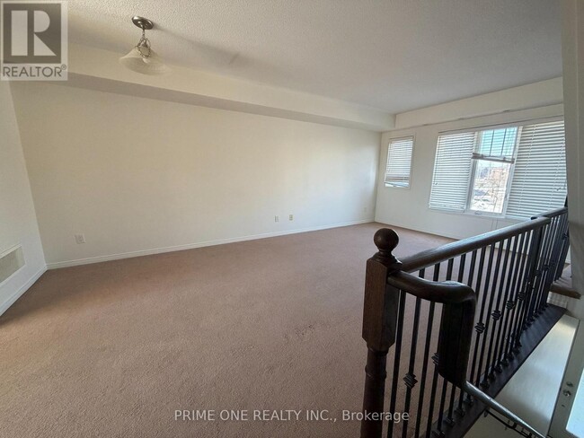 Building Photo - 5605 Oscar Peterson Blvd