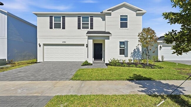 Photo - 10761 Northwest Everbreeze Drive, Port St. Lucie, FL 34987 - 5 BR 3 BA single-family home