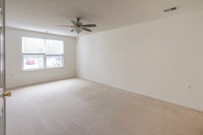 Bedroom with natural light and ceiling fan - 10024 Vanderbilt Cir (Rockville, MD) Apartment