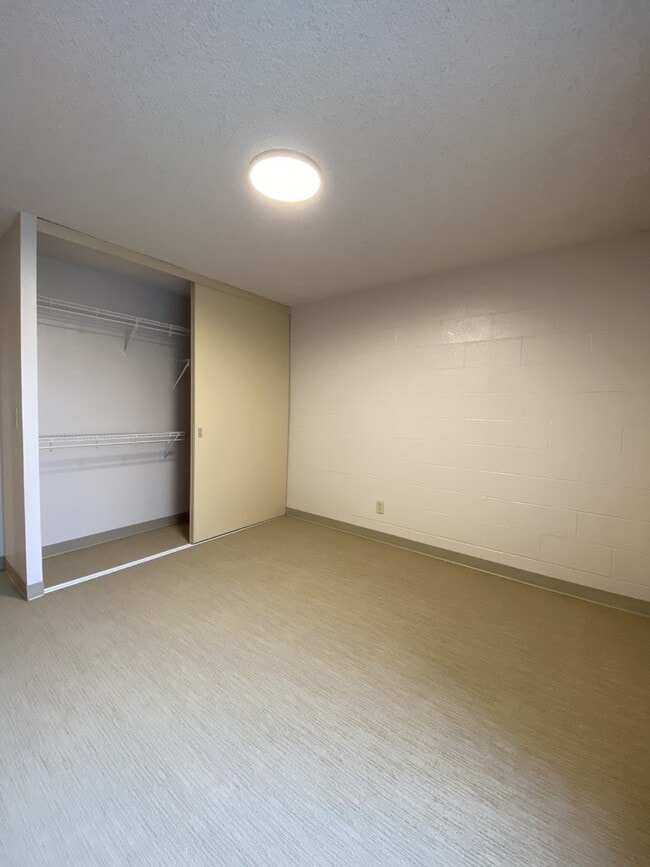 06 Classic | Main Bedroom Closet - Olympic Park Apartments