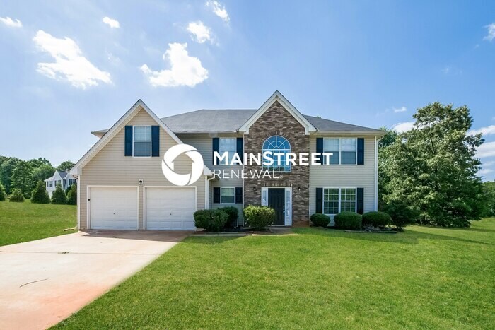 Foto principal - 4 Bedroom Pet-Friendly Home in Hampton, GA...