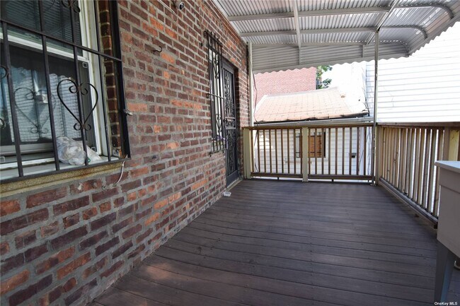 Building Photo - 42-65-65 65th Pl