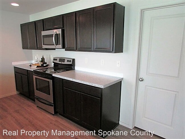 Building Photo - 4 br, 2.5 bath House - 1107 N Manifold Lane