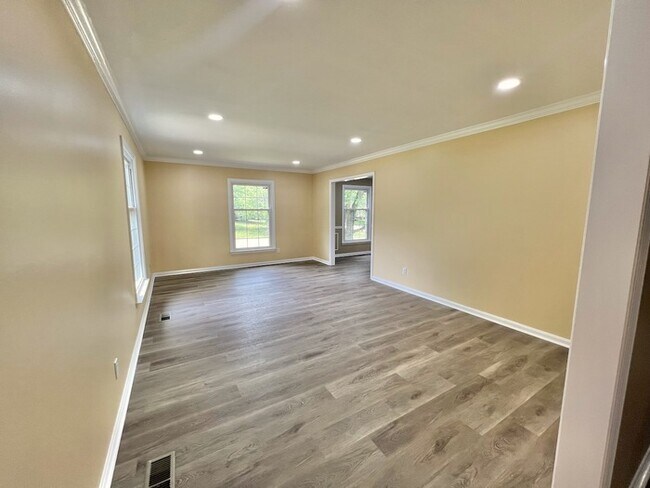 Building Photo - Unique 2 Story with Room for All! Finished...