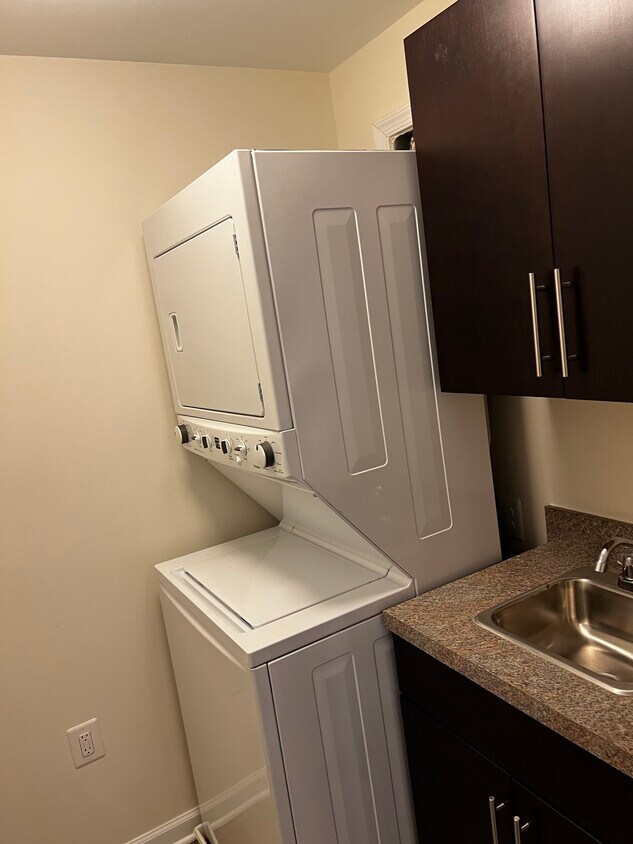 Washer and dryer in unit with a sink - 8101 Greenbelt Station Pky