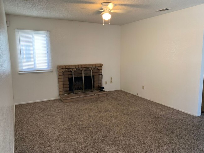 Building Photo - ENJOY THE POOL THIS SUMMER IN THIS GATED C...