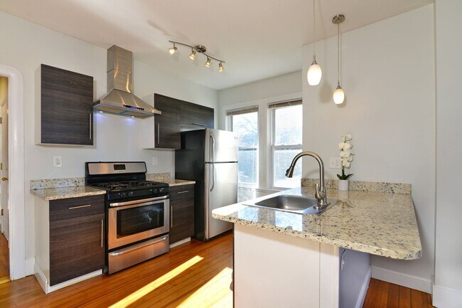 Building Photo - First Floor- 3 Bedroom with parking and ow...