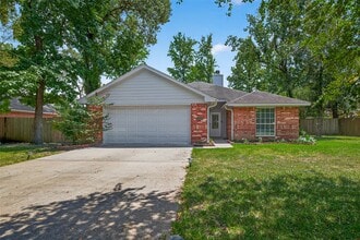 Building Photo - 6719 Woodland Oaks